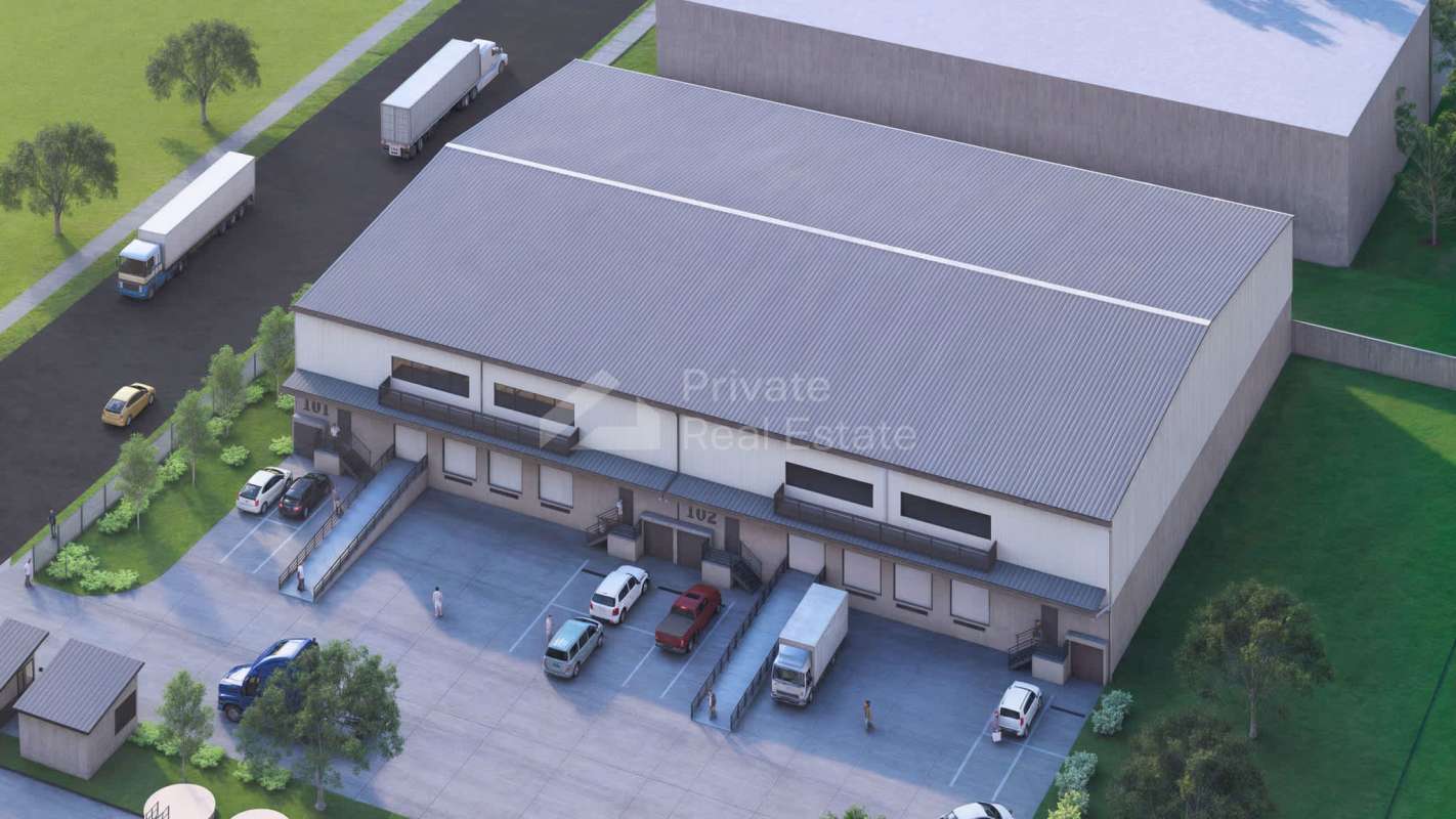 Aerial perspective warehouse facilities with multiple docks trucks and parking in Tocumen Commercial Park Panama City
