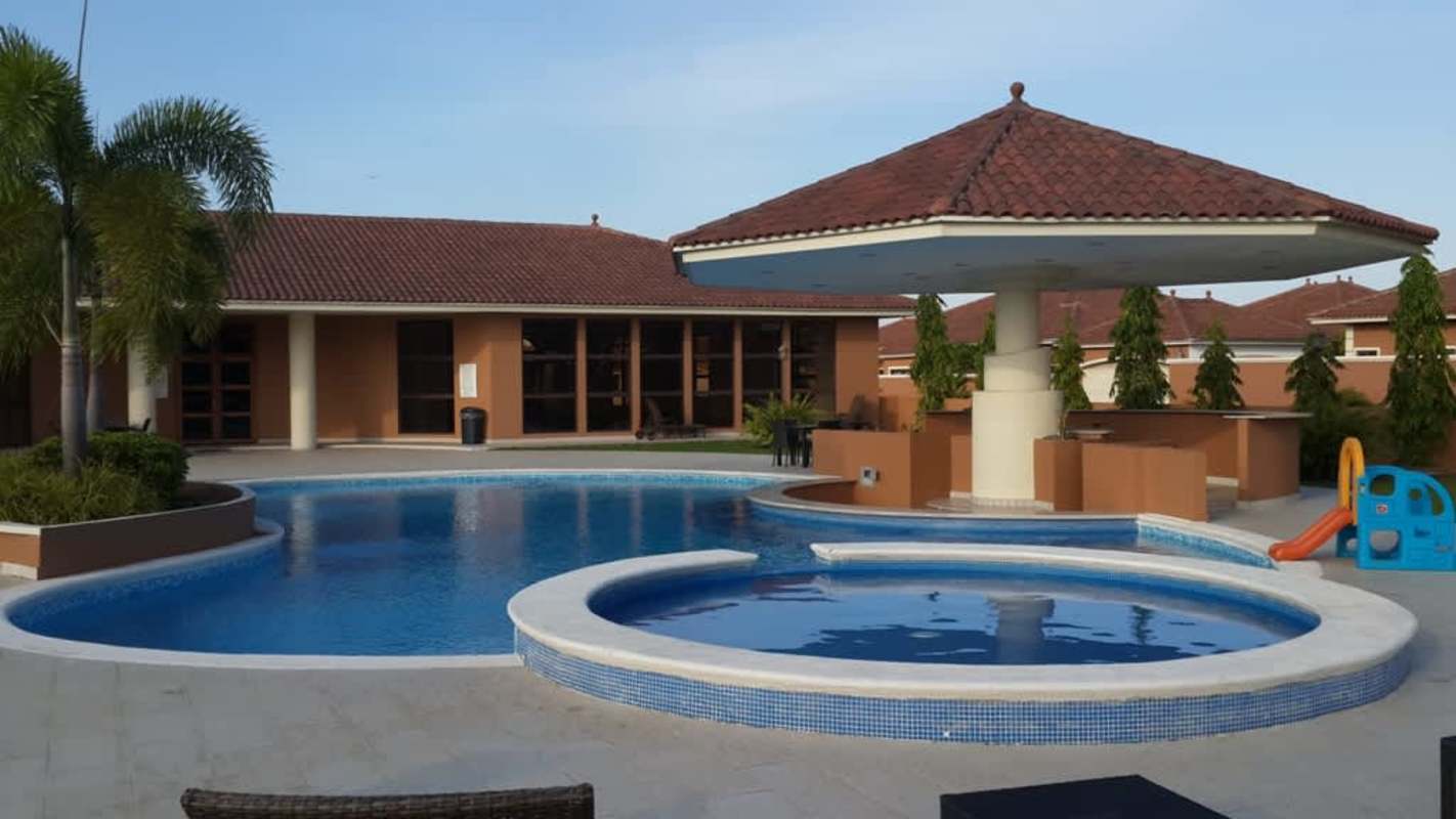 Open concept kitchen with granite counters and island in Costa Sur Panama