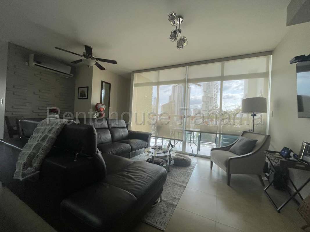 Contemporary kitchen with granite countertops, built-in appliances at The One Tower San Francisco Panama