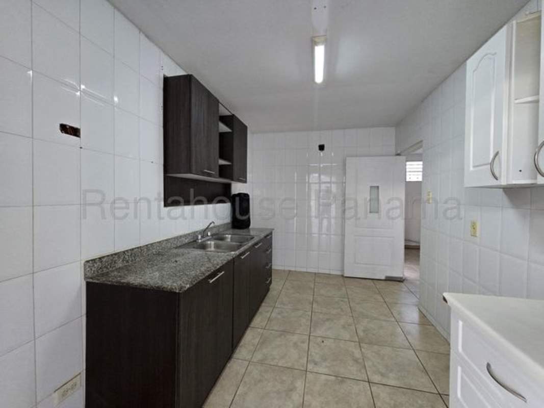 Outdoor laundry area with concrete sink washer setup house rental Brisas del Golf