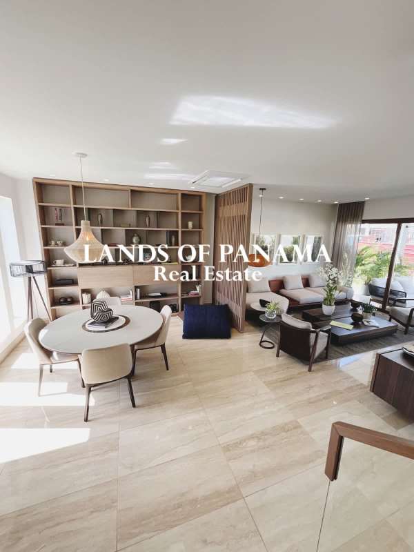 Modern kitchen with marble countertops island seating The Woods Santa Maria Panama