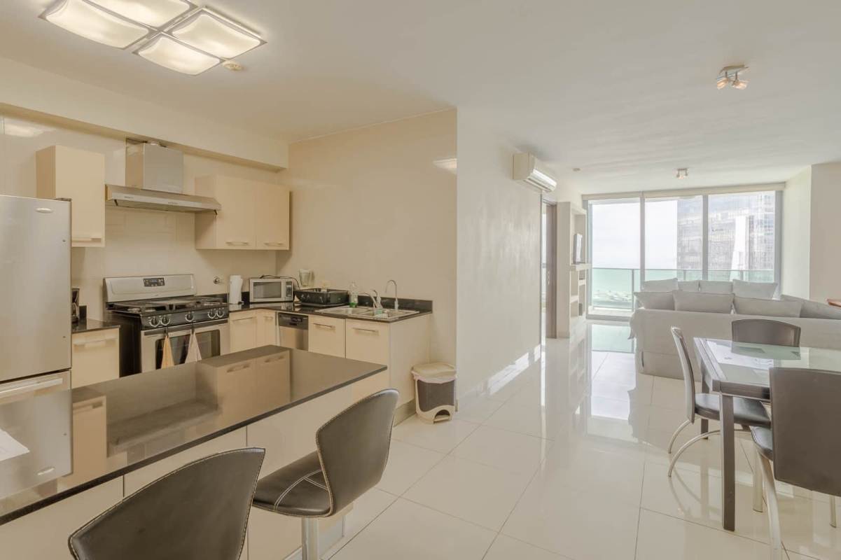 Open living dining with large window ocean skyline view PH Allure Panama