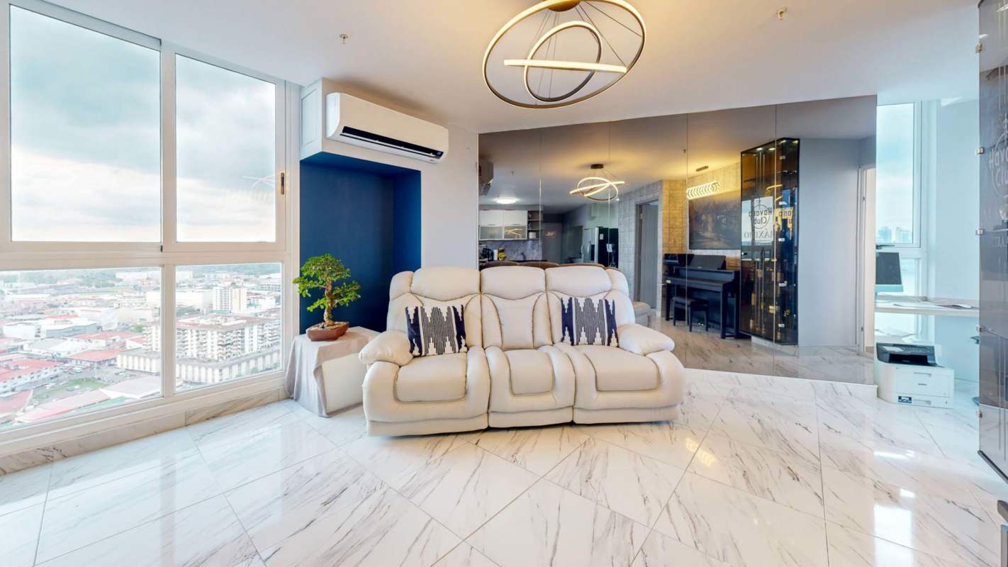 Modern kitchen with granite countertops, dishwasher and marble backsplash at The Sands Panama