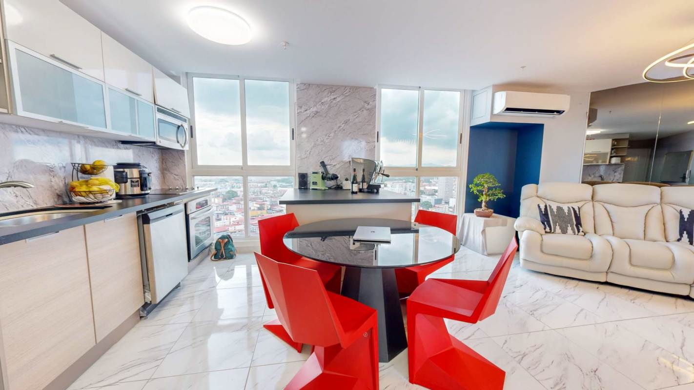 Luxury apartment living area with marble floors and panoramic ocean skyline views at The Sands Avenida Balboa Panama City