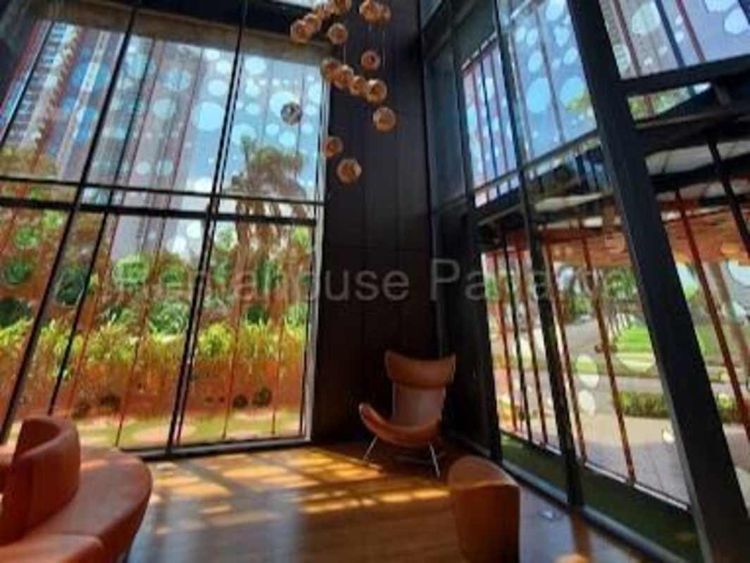 Spacious lobby orange seating modern glass decor PH Costa del Este Panama
