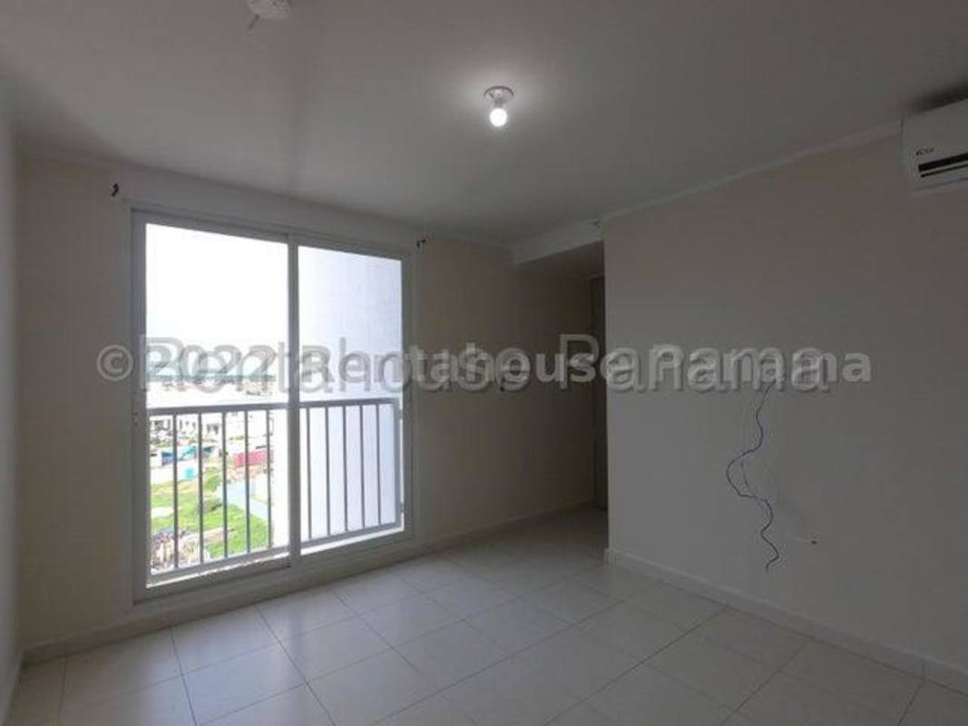 Living room with tile flooring and balcony access apartment for rent in Costa Sur Panama