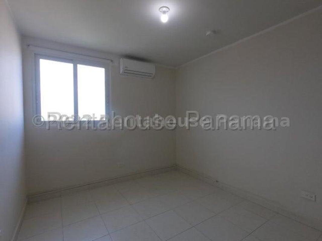 Empty third bedroom or versatile space tiled floor window Versalles apartment for rent Panama