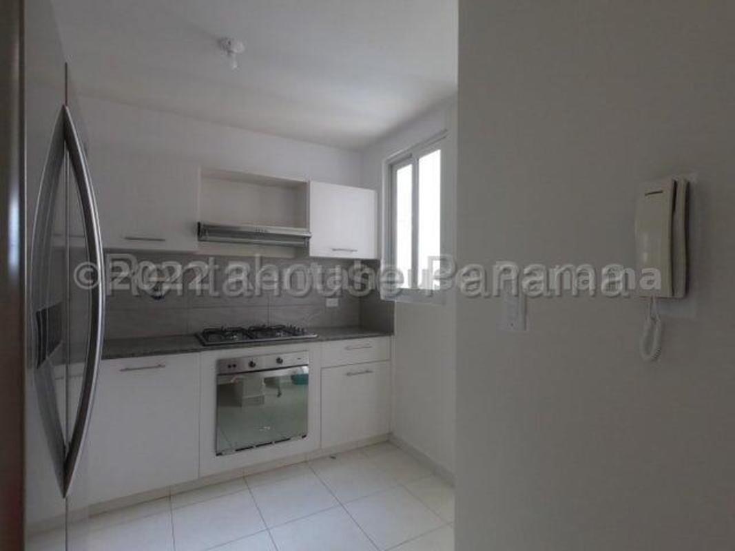 Bright kitchen with window gas cooktop white cabinets Versalles Panama rental