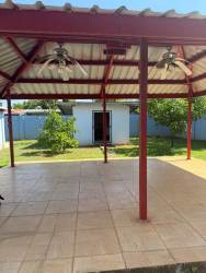 Gated entrance driveway and front lawn garden Villa Mercedes David Panama