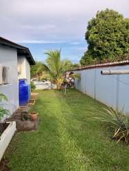 Lawn with water tank, fence in garden house for rent in David Panama