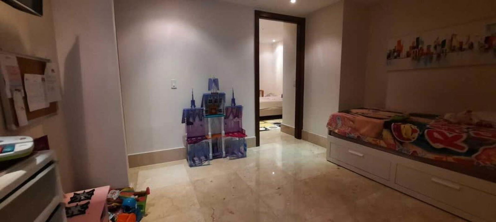 Kids bedroom featuring marble flooring and colorful decor at The Reserve Santa María Panama