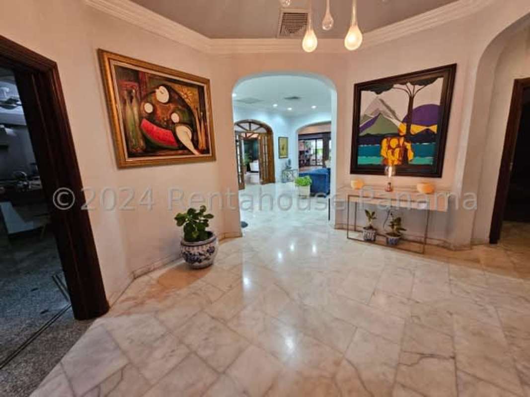 Formal dining room with marble floors and elegant furnishing luxury villa Altos del Golf Panama City