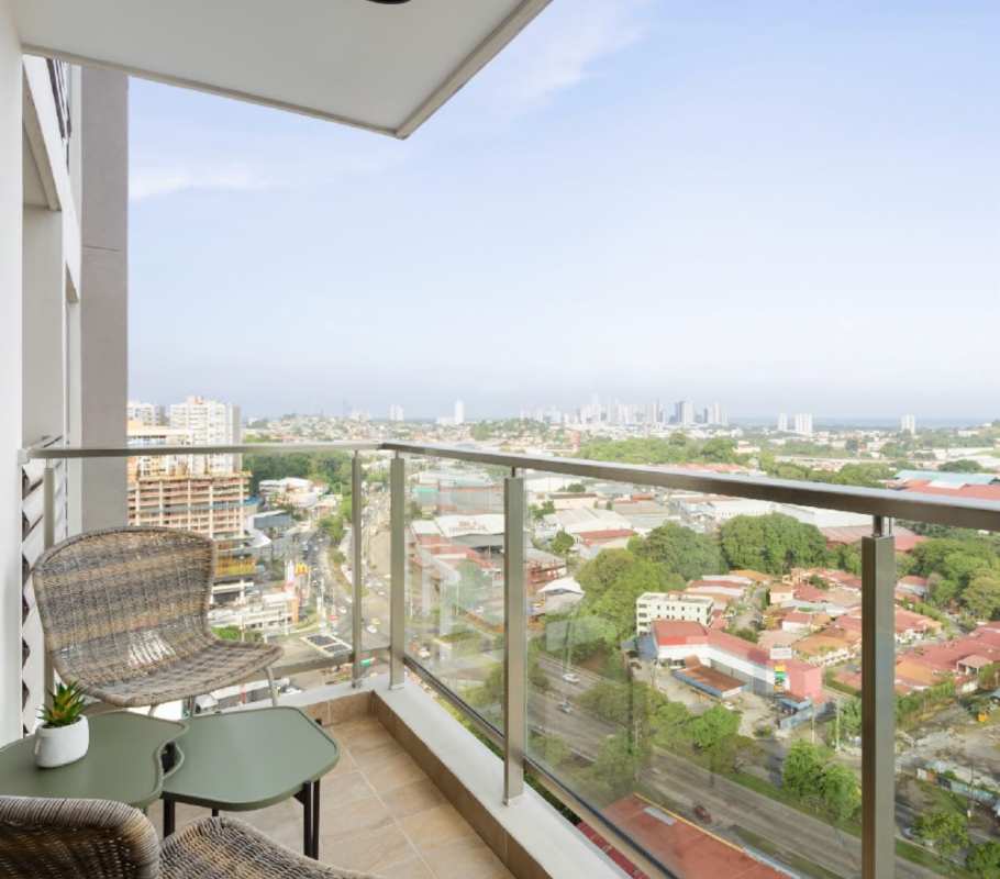 Dining area with marble-top table, wall mirrors, and contemporary decor in PH Spotlight Panama