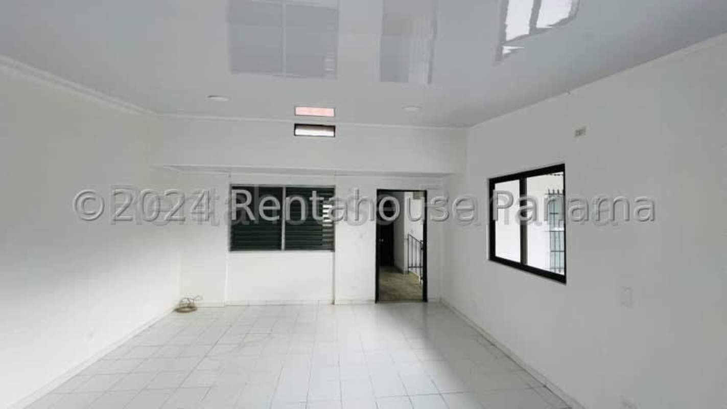 Modern minimalist empty living room with tiled floor rental property Panama