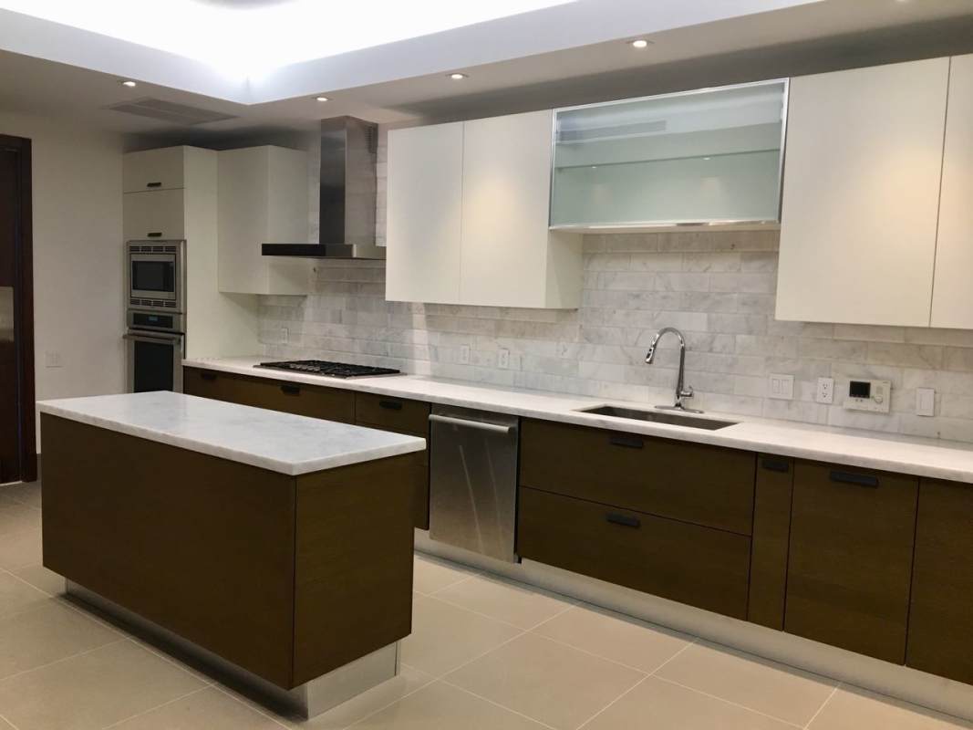 Bright living space with floor-to-ceiling windows and nature views in PH Casa Blanca Santa Maria Panama