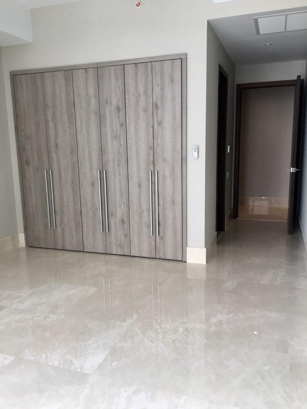 Bedroom with built-in wardrobe and marble floor in PH Casa Blanca Santa Maria Panama City