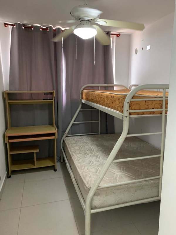 Bedroom with window, closet and ceiling fan in PH Torres de Toscana near UTP Panama