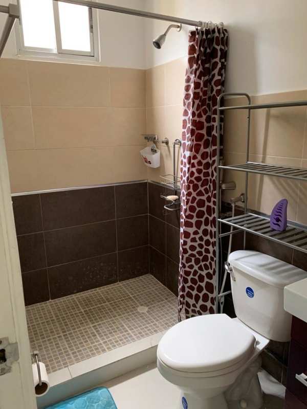 Modern kitchen with granite countertop and breakfast bar in PH Torres de Toscana Tumba Muerto Panama