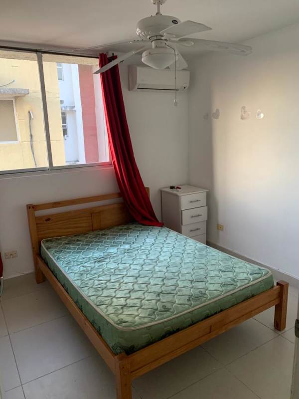 Master bedroom with closet, window, and private bath in PH Torres de Toscana Tumba Muerto Panama