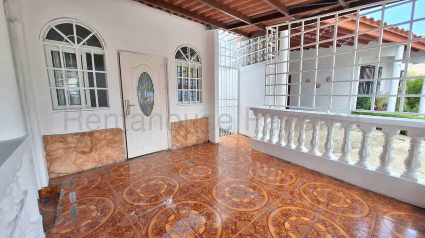Empty living room with recessed lighting, large window and tiled floor in Altos de Panamá Condado del Rey