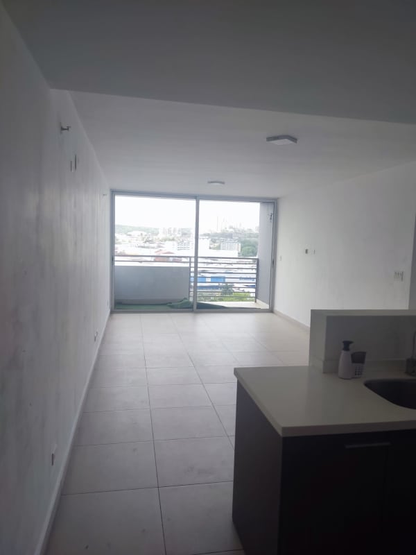 Spacious living room open kitchen balcony glass doors PH Scala Panama City
