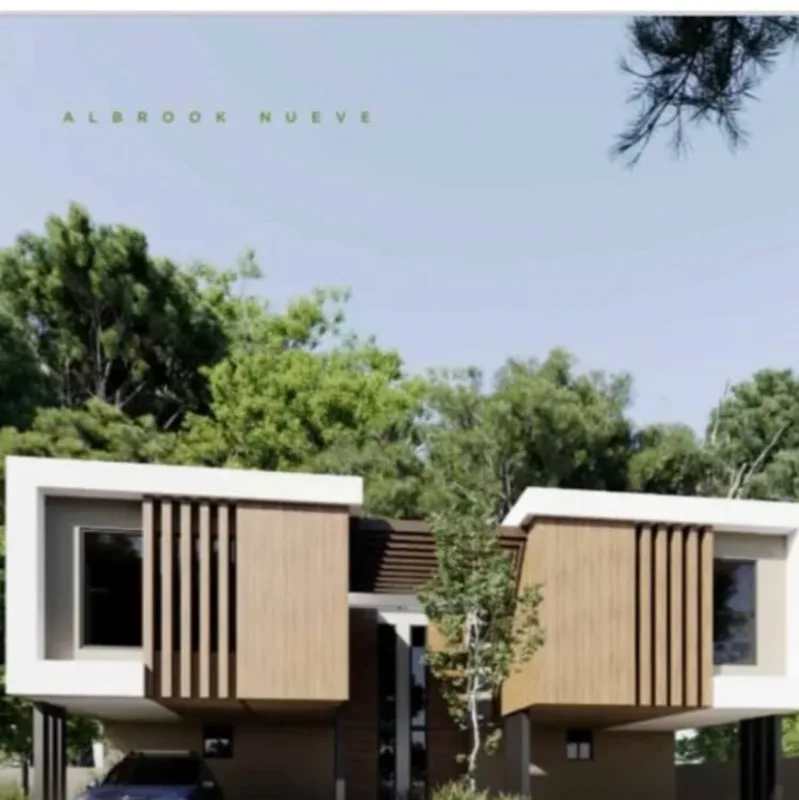 Contemporary kitchen marble backsplash light wood cabinets large windows Albrook Residences Panama