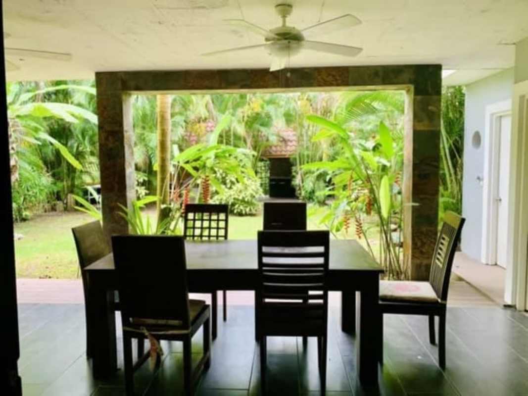 Dining area with garden views large windows duplex home in Albrook Clayton Panama