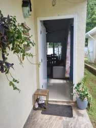 Covered parking for two cars and entry to single-family house in Vista Alegre Nuevo Emperador Panama