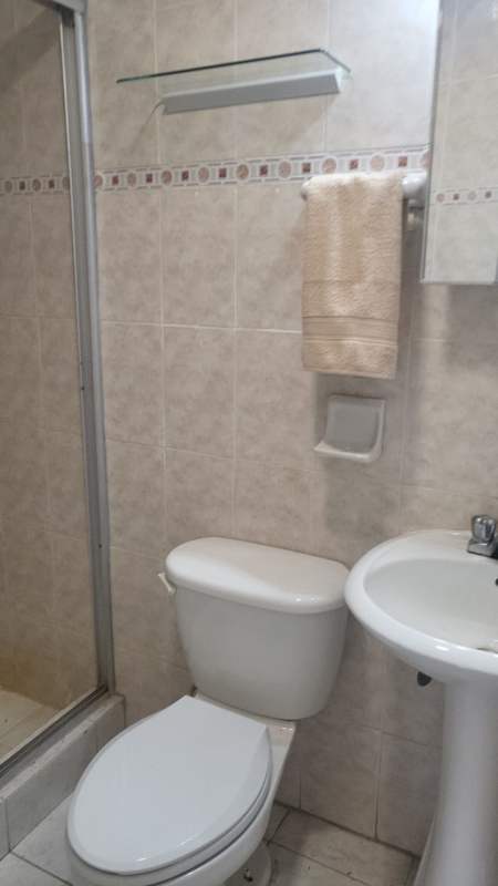 Second bedroom with closet and large window in PH Albrook Park Clayton Panama