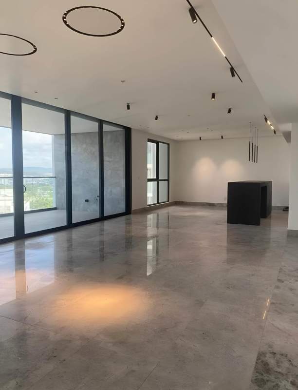 Spacious open plan living and dining with golf view The Empire Residence Panama