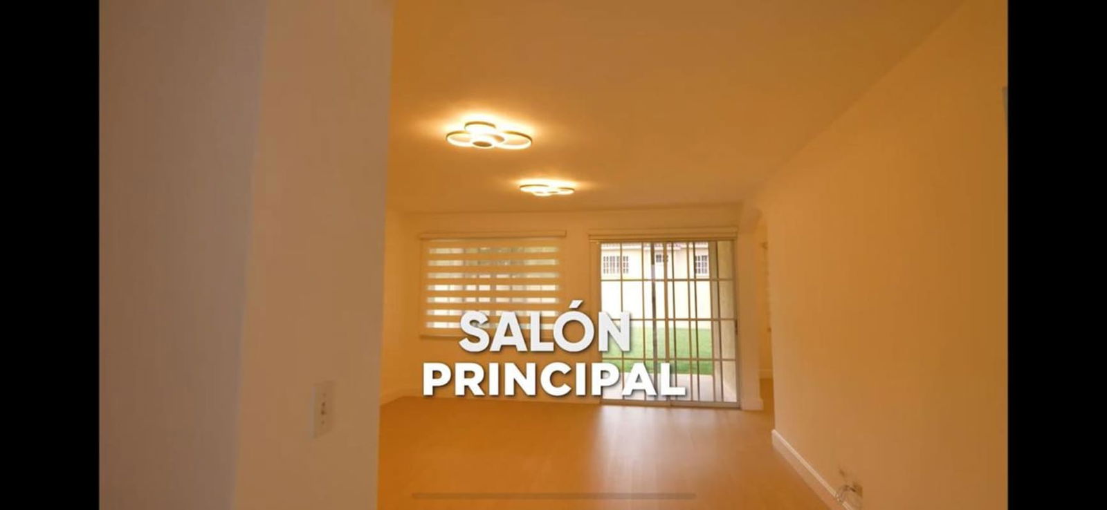 Living room with large windows, wood floors, natural light and garden view in Albrook Gardens Panama
