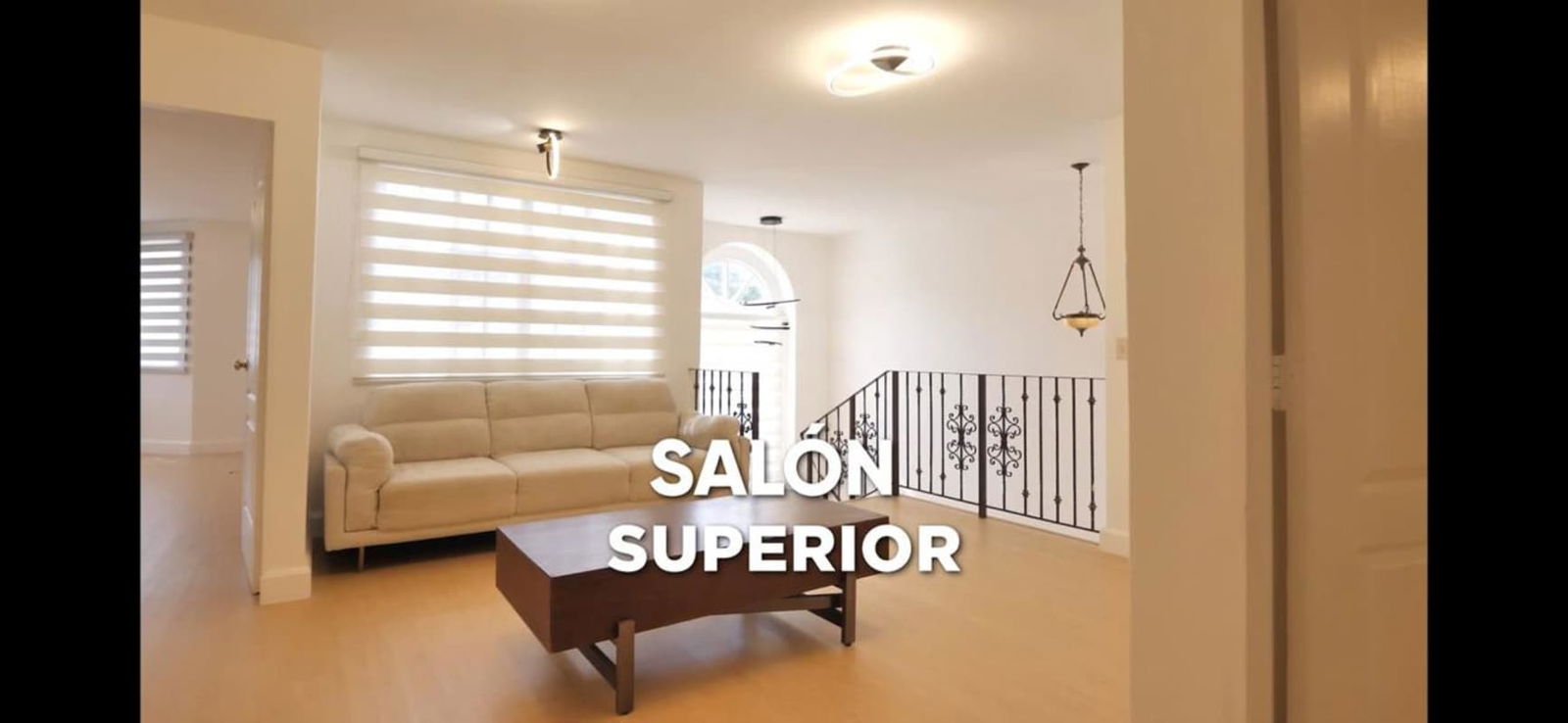 Bright second living room with iron railing window blinds sofa Albrook Gardens Panama