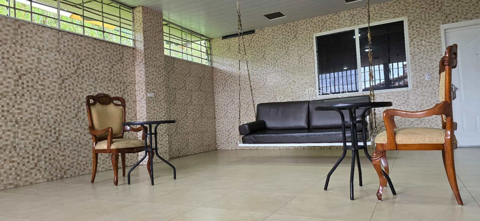 Modern kitchen with granite countertops, dark wood cabinets, stainless steel appliances PH Altos del Country, Panama