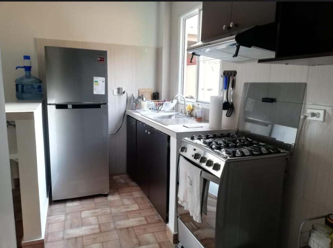 Stainless steel appliances in a compact kitchen at Casa 725 Clayton Panama