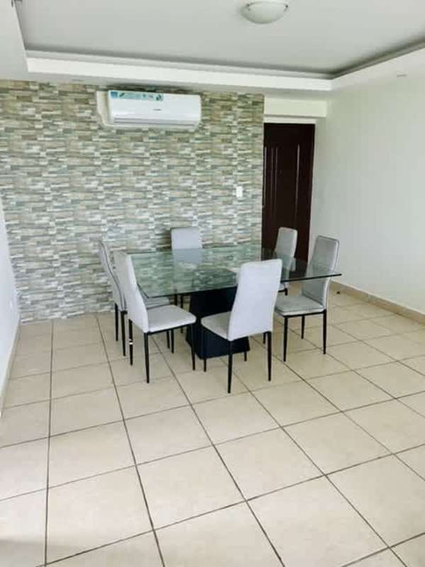 Outdoor swimming pool with sun loungers next to residential condo PH Clayton Park Clayton Panama