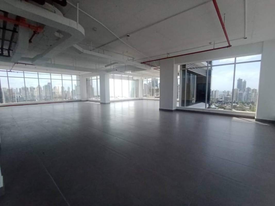 Office open space with ceilings exposed ducts lighting Obarrio Panama