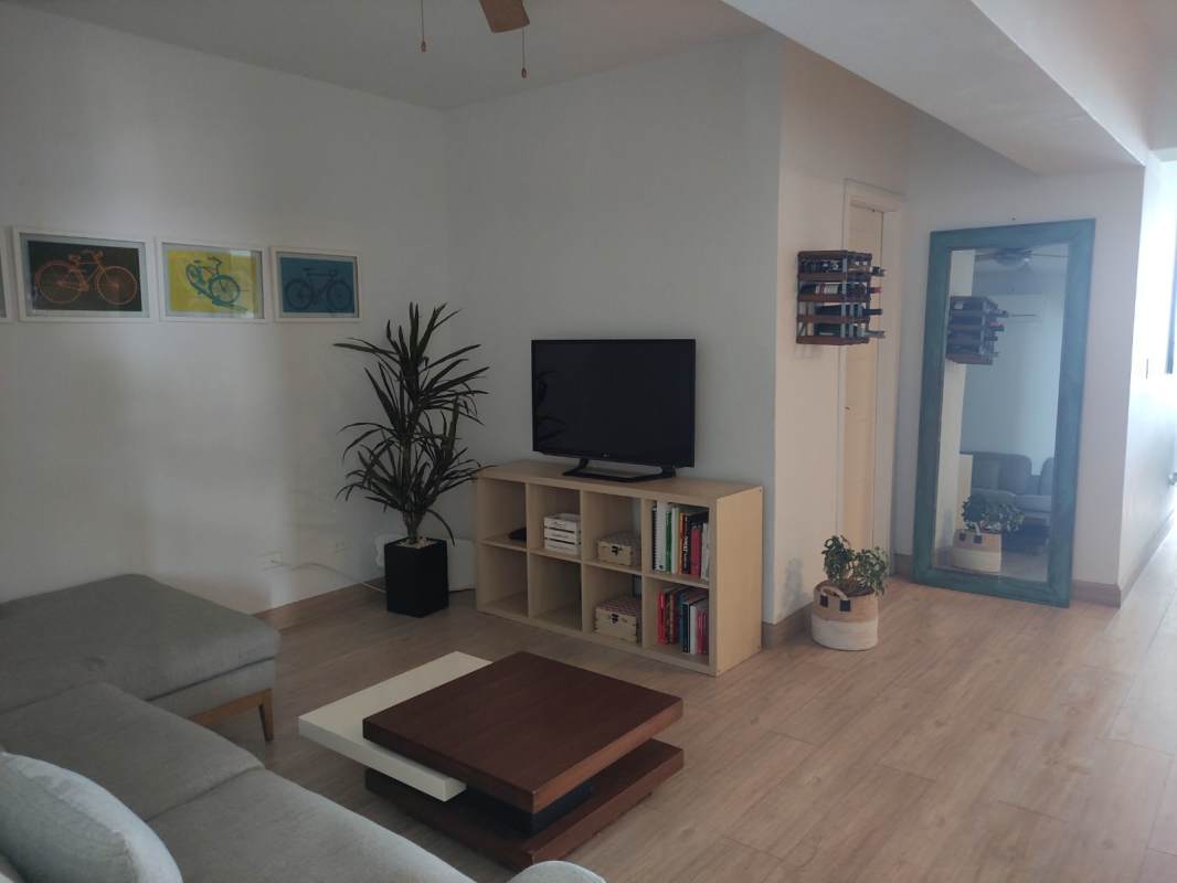 Luxury apartment living room with large windows ocean view at PH White Tower Panama