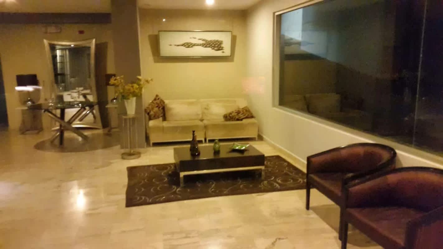 Modern apartment lobby with designer furniture and art in PH Privé Panama City