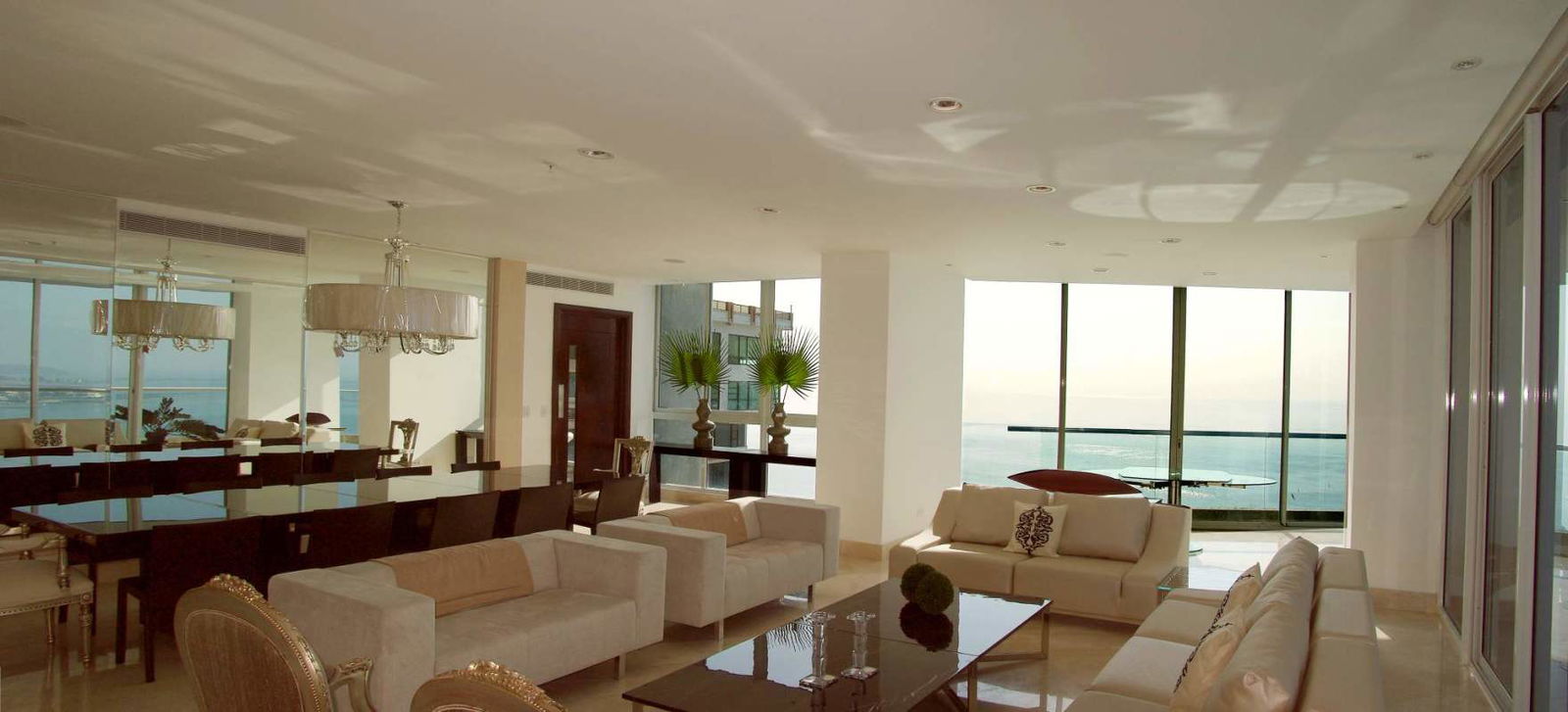 Night city skyline from oceanfront luxury high-rise The Point in Punta Paitilla Panama