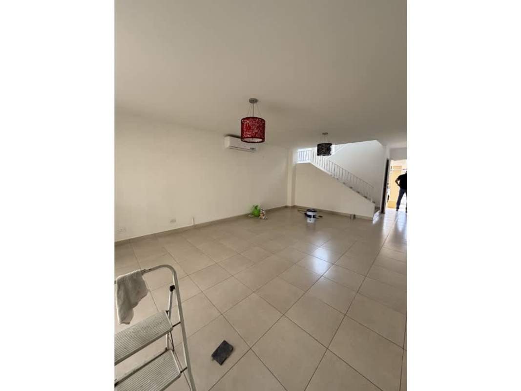 Living space with staircase and minimalist finish in PH Villa Tiloli Brisas del Golf