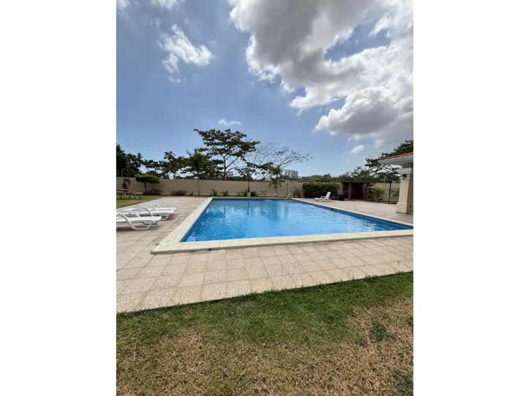 Covered tiled patio leading to green yard PH Villa Tiloli Panama