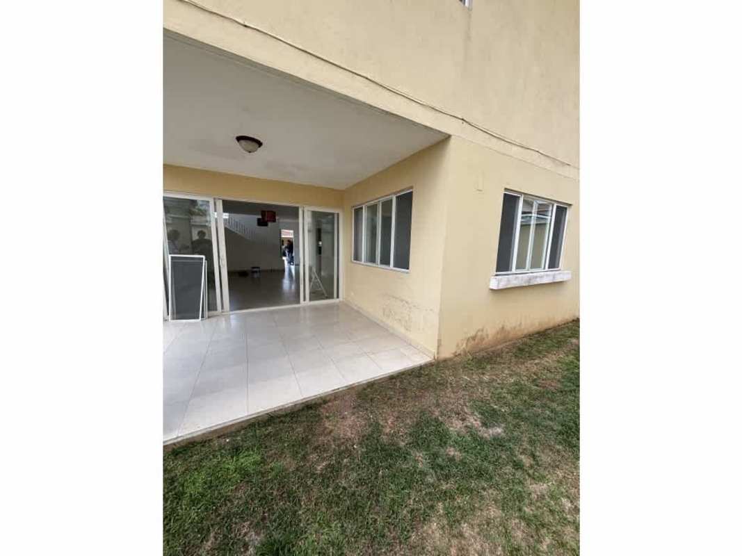 Outdoor tenant-only pool with lounge chairs PH Villa Tiloli Brisas del Golf