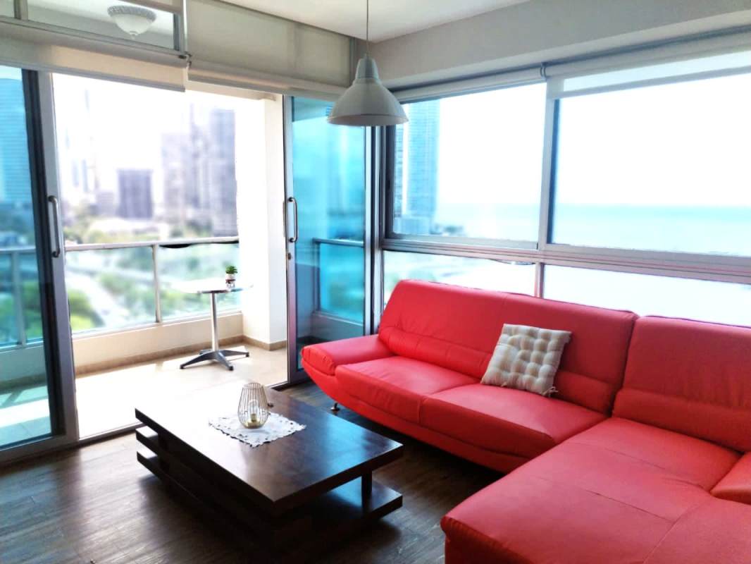 Furnished master bedroom floor-to-ceiling windows with skyline view PH Bayfront Panama