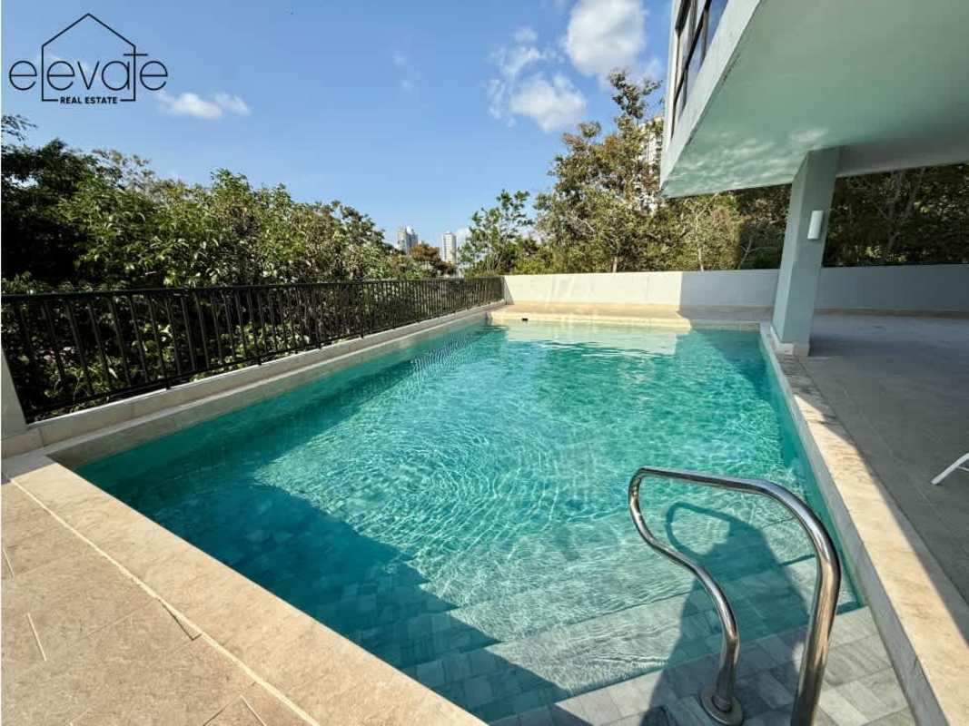 Gourmet kitchen with granite island stainless appliances at PH Elite La Cresta Panama