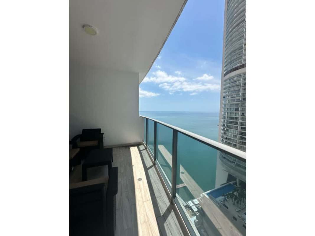 Private furnished balcony with panoramic views of Pacific Ocean from Grand Tower high-rise Panama City