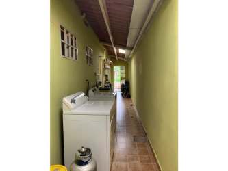 Laundry room with wash area in house Platinium Park Arraiján Panama