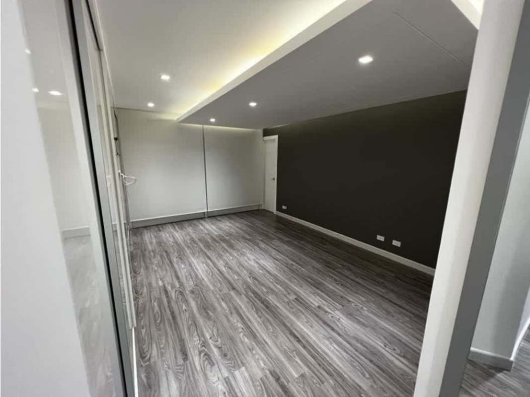 Curved glass railing balcony with artificial grass and panoramic skyline view from apartment in PH Joy Tower San Francisco Panama