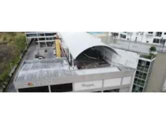 Commercial rental property with retail outlets and signage Mi Condado Condado del Rey Panama