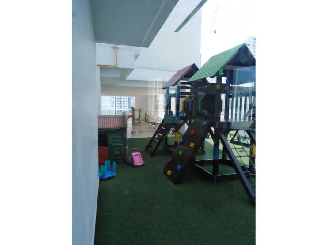 Indoor children's playground with slides and equipment at Titanium Tower San Francisco Panama