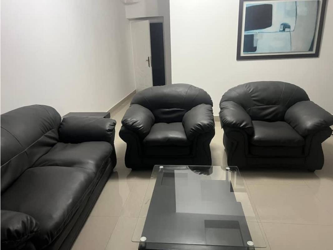 Open dining area with balcony city views in furnished condo PH Titanium San Francisco Panama